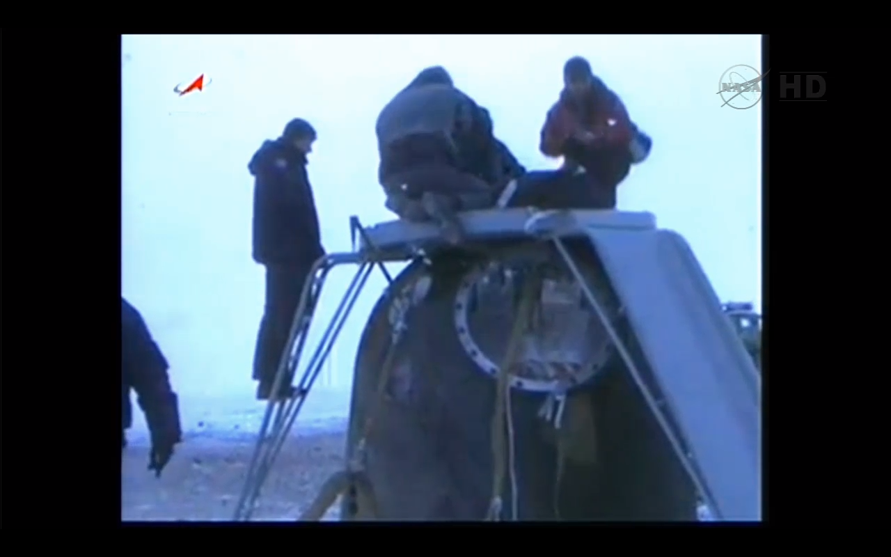 Soyuz Space Capsule Makes Foggy Landing with US-Russian Crew